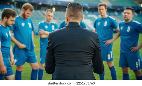 Professional Soccer Team Training, Tactical Coaching: Football Coach Explains Game Strategy, Develop Workout Plan Trainer Motivates Athletes, Leads to Victory, Preparing For Championship. Back View - Powered by Shutterstock