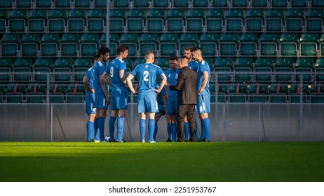 Professional Soccer Team Training, Tactical Coaching: Football Coach Explains Game Strategy, Tactics, Workout Plan to Players. Trainer Motivates Athletes, Leads to Victory, Preparing For Tournament - Powered by Shutterstock