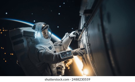 Professional Space Engineer Servicing a Panel on Communication Satellite. Brave Caucasian Male Astronaut Working in Outer Space with Beautiful Dark Side of Planet Earth in the Background
