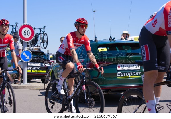 Professional sport\
road cyclist Sylvain Moniquet from team Lotto at UCI World Tour\
race Tour de Suisse on a sunny summer day. Photo taken June 12th,\
2022, Küsnacht,\
Switzerland.