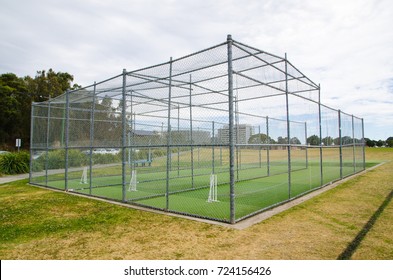 Professional Steel Cricket Cage on the green field.
