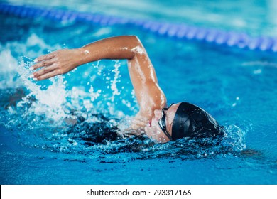 Professional swimmer, swimming race, indoor pool - Shutterstock ID 793317166