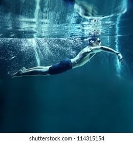 professional swimmer underwater swimming Butterfly
