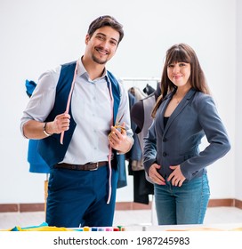 Professional Tailor Taking Measurements For Formal Suit