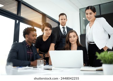 Professional, teamwork and business people in office with laptop for discussion, planning and brainstorming ideas. Team, creative and employees with computer for connection, tech or startup project - Powered by Shutterstock