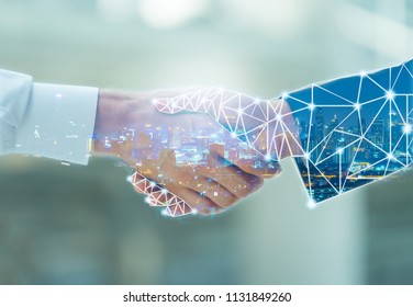Professional teamwork and network connection technology concept, Double exposure of arab Business man handshake to his business partner with digital graphic against city night background in meeting