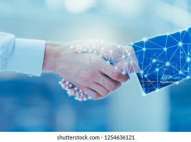 Professional Teamwork And Network Connection Technology Concept, Double Exposure Of Arab Business Man Handshake To His Business Partner With Digital Graphic Against City Night Background In Meeting