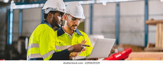 professional technician engineer with safety helmet hard hat working in industrial manufacturing factory, men at work to checking equipment of machinery production technology or construction operating - Powered by Shutterstock