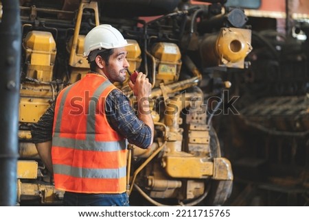 professional technician engineer working to control electrical power and safety service system, electrician working to maintenance and checking industrial equipment in term of factory technology