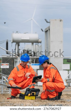 Professional technician inspecting electrical systems at a modern power station during scheduled maintenance, ensuring safety and efficient operation.