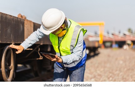 Professional Technician Pre-check Freight Trains, Engineer Man Working In Cargo Train Platform, Technician Checking Brake System Of The Freight Car, Safety Concepts