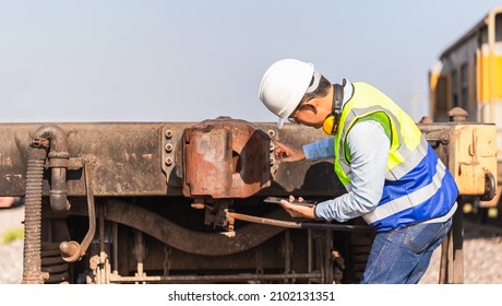 Professional Technician Pre-check Freight Trains, Engineer Man Working In Cargo Train Platform, Technician Checking The Freight Car, Safety Concepts