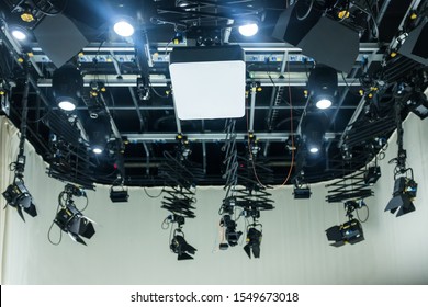 Professional Television Studio Equipment. Full Studio Lighting Rig, Teleprompter And Cables. Recording Show In TV Studio. – Image