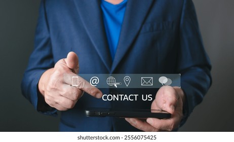 professional touch with a virtual Contact Us interface on a tablet, featuring icons for email, phone, location, and web, symbolizing modern communication and business connectivity. - Powered by Shutterstock