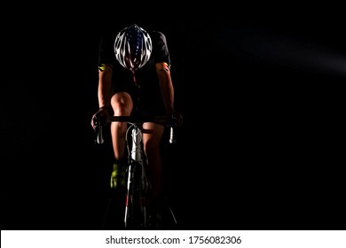 professional triathlete cycling road bike, sport concept, smoke background