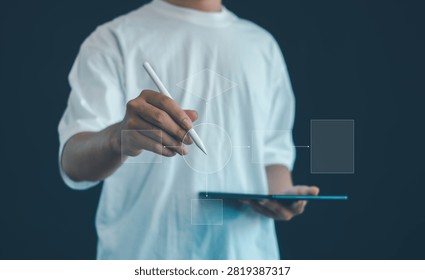 Professional using a digital tablet to create a business flowchart and process model, illustrating workflow design, system analysis, decision mapping, process optimization and automation.