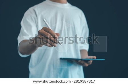 Professional using a digital tablet to create a business flowchart and process model, illustrating workflow design, system analysis, decision mapping, process optimization and automation.