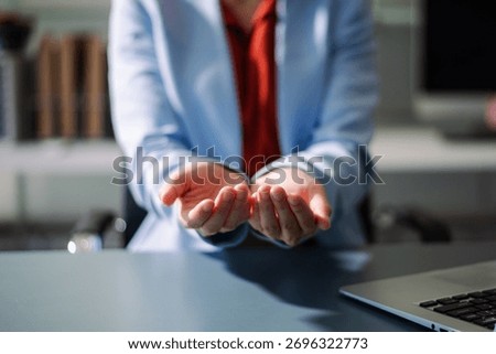 Professional using digital tablet in office, symbolizing technology, innovation, productivity, and teamwork in business communication and digital workflow.