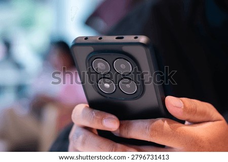 Professional Using Smartphone for Mobile Communication and Productivity