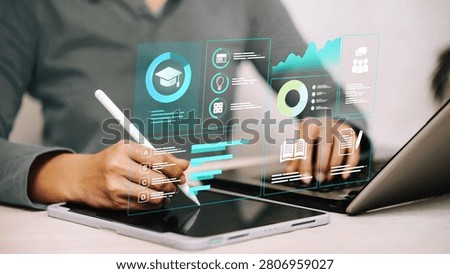 Professional using a tablet and laptop with an interactive education dashboard, representing online learning, course management, student assessment, learning analytics, digital education, virtual classroom and EdTech innovation.