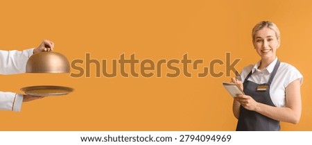 Professional waitress taking order with chef presenting covered dish, restaurant service and hospitality