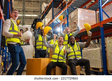 Professional Warehouse Worker Team Celebrating Success In Warehouse Factory, Cheerful Workers Having Fun At Work, Happiness At Job, Concept Of Success, Happy Team Enjoying Their Successful Job