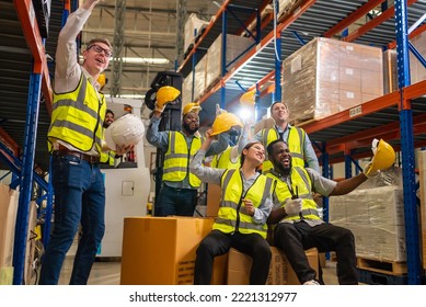 Professional Warehouse Worker Team Celebrating Success In Warehouse Factory, Cheerful Workers Having Fun At Work, Happiness At Job, Concept Of Success, Happy Team Enjoying Their Successful Job