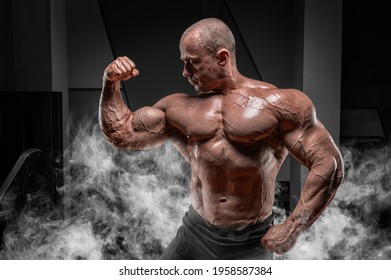 Professional Weightlifter Posing In The Gym. Classic Bodybuilding. Mixed Media