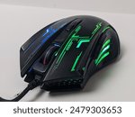 Professional wired gaming mouse from front view on white background