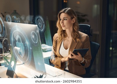 Professional Woman Working On Cybersecurity With Holograms In Modern Office Environment