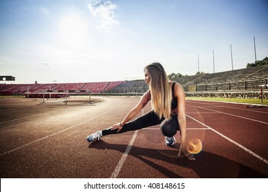 Professional women athlete on the track. - Powered by Shutterstock