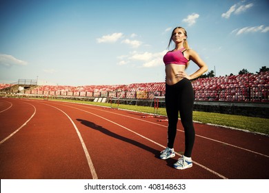 Professional women athlete on the track. - Powered by Shutterstock