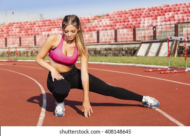 Professional women athlete on the track. - Powered by Shutterstock