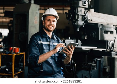 Professional worker of manufacturing plant factory. Engineer working with machine Maintenance machine, mechanical engineering portrait working teamwork. - Shutterstock ID 2261883281