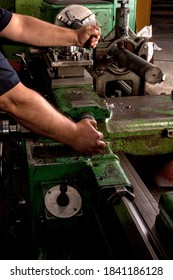 Professional workers are doing the milling process for metal parts, metal machinery in large industrial plants-image