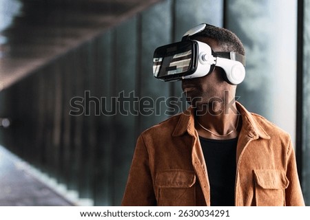 Professional working in contemporary workspace, using vr headset while navigating digital environment