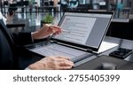 Professional Writer Using Computer Editing Software To Proofread Document Content