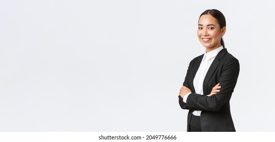 Professional young asian female entrepreneur, real eastate agent in suit cross arms and looking confident at camera. Successful businesswoman leading business. Team lead starting meeting - Powered by Shutterstock