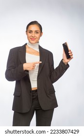 professional young woman using smartphone - Shutterstock ID 2233807429