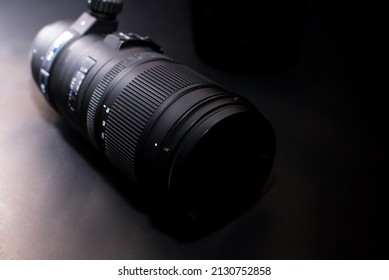 Professional Zoom Lens For Digital Cameras Isolated On A Black Background