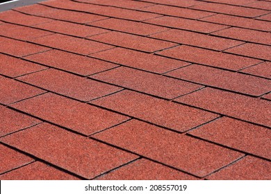 Professionally Laid Red Asphalt Shingle Rectangular Shape On The Roof Pergola