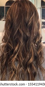 Professionally-styled Hair With Beach Waves At Hair Salon