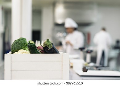 Professionals Chefs Cooking Together In A Kitchen.