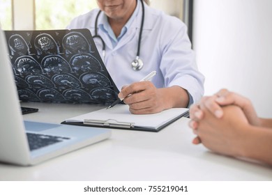 Professor Doctor Report And Recommend A Method With Patient Treatment, Results On Brain X-ray Film About The Problem Of The Patient.