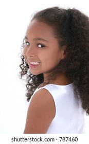 Profile Of Beautiful Little Six Year Old Girl Looking Over Shoulder.  Wearing White Dress Over White.