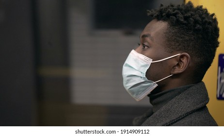 Profile Of Black African Man Wearing Covid-19 Face Mask Inside Subway Metro