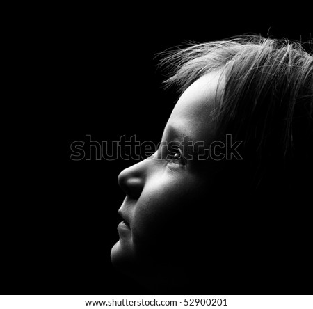 Profile of a child's face with high contrast light