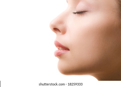 Profile of feminine face with closed eyes and make-up