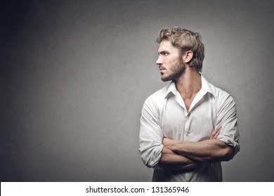 Profile Of Handsome Man On Gray Background