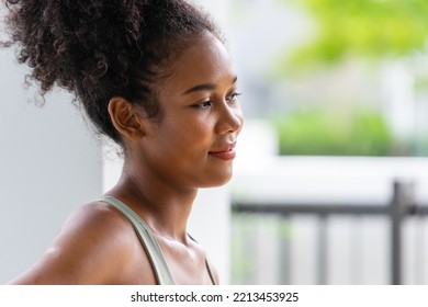 Profile Head Shot Of African Woman With Afro-textured Hair
 Wearing Workout Clothes